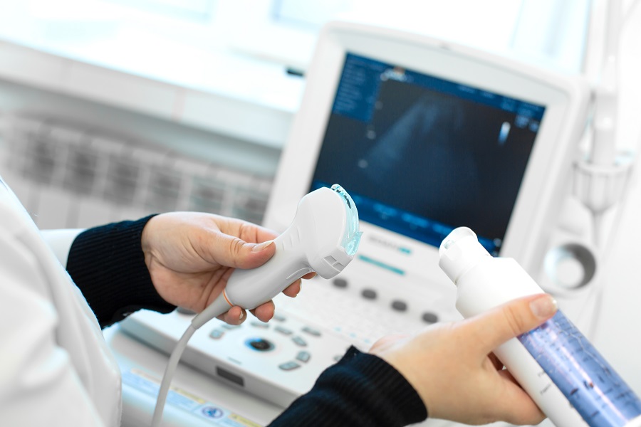Doctor with Diagnostic ultrasound | Dr. Amy Martin