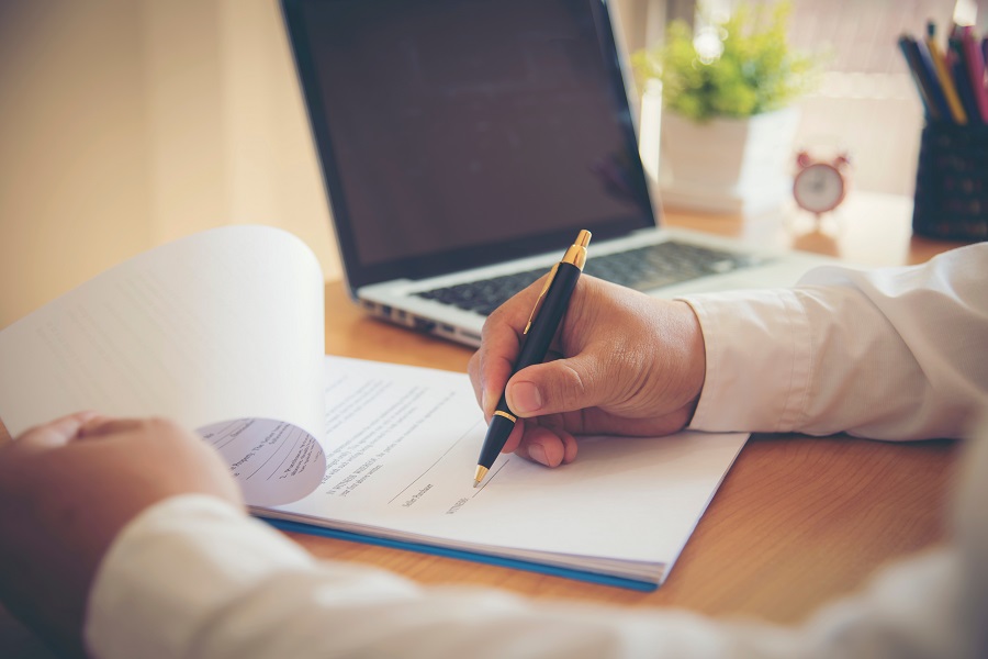 Doctor Checking the Patient files | Dr. Amy Martin M.D