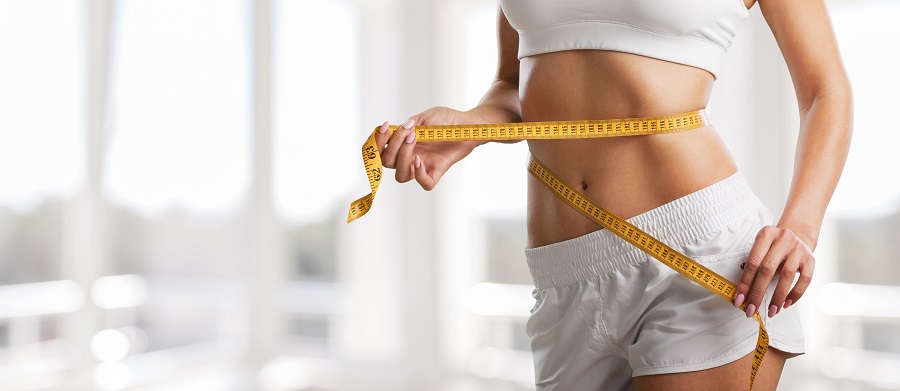 Woman with perfect belly | Weight loss treatment at Dallas, TX